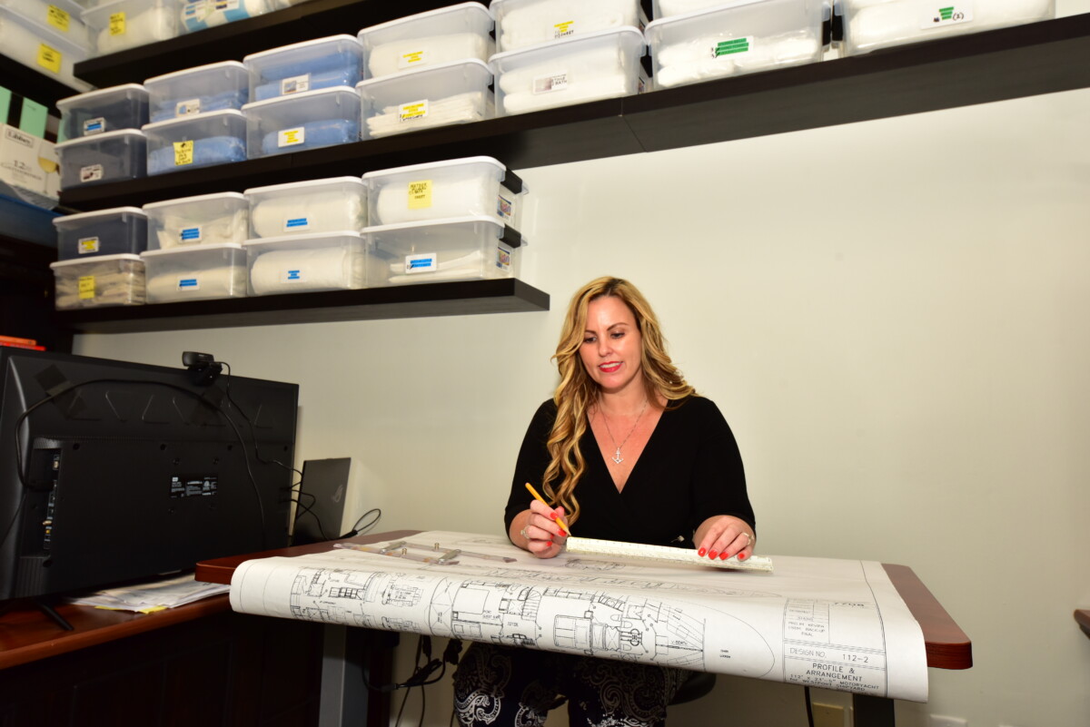 DESTRY IN OFFICE WITH DRAWINGS